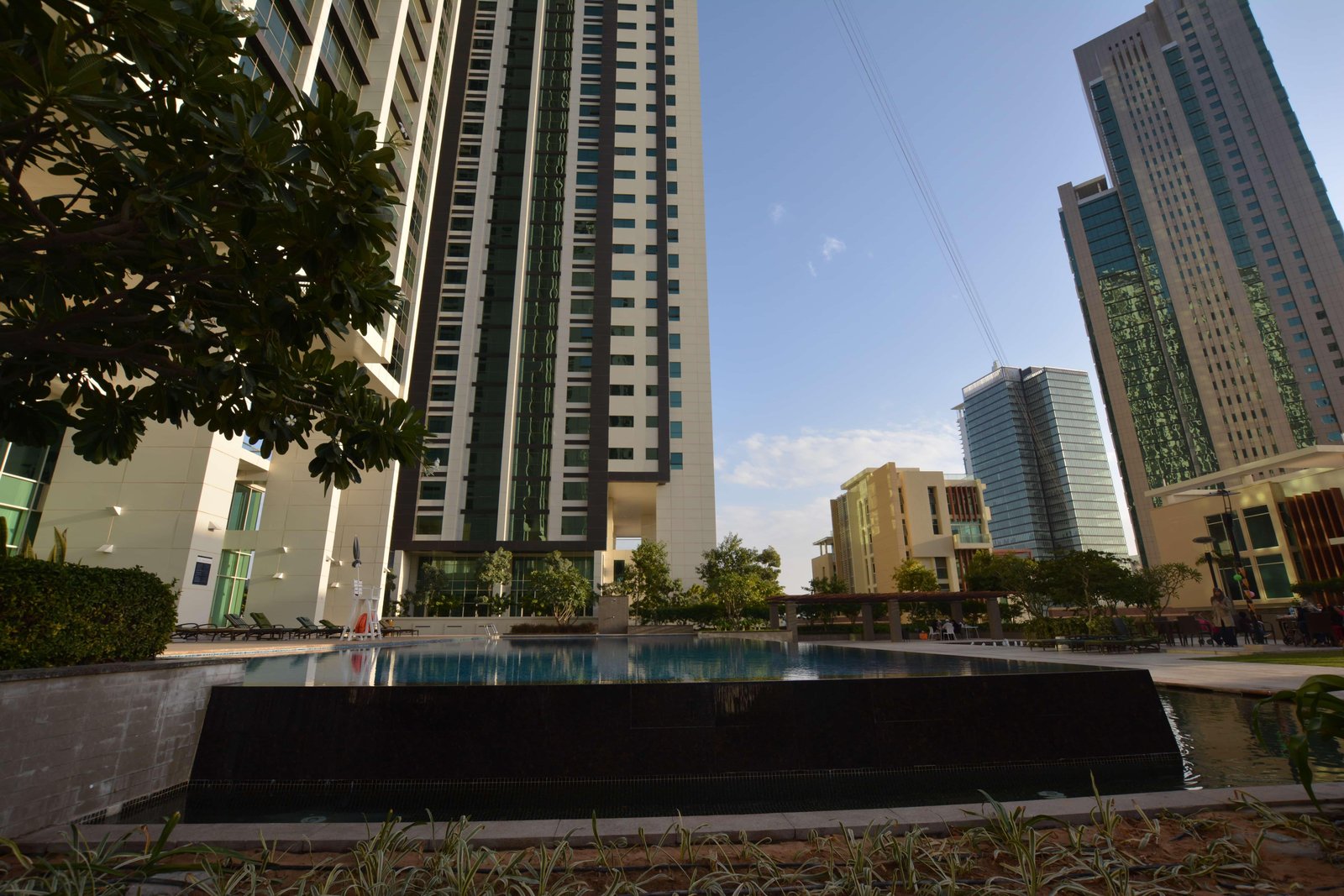 Exterior view of Al Maha Tower Marina Square Al Reem Island Abu Dhabi showcasing luxury high-rise apartments and Marina waterfront